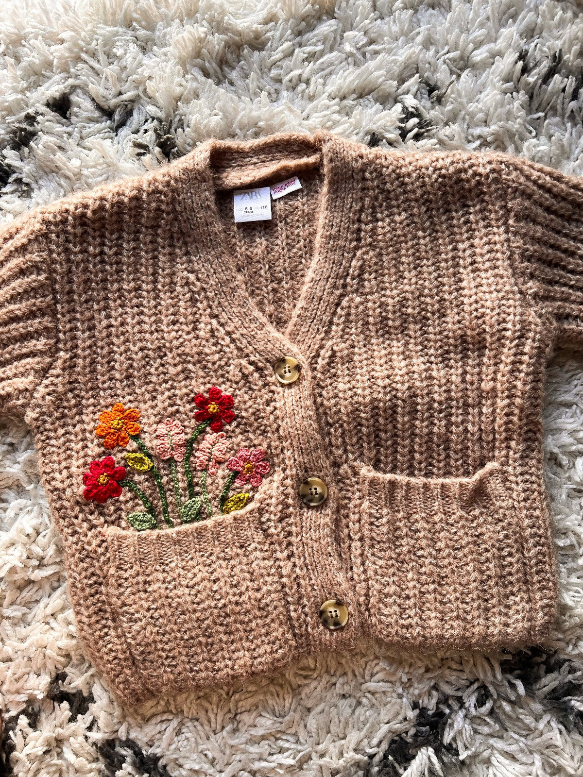 Beige handknitted cardigan